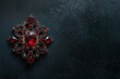 ruby brooch on black background
