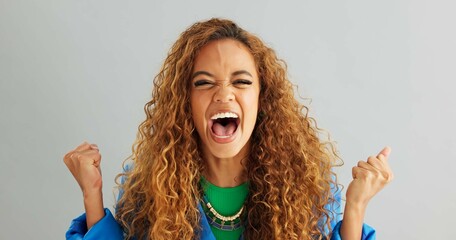 Poster - Excited woman, fist pump and celebration with deal, promotion or winning on a gray studio background. Portrait of happy female person or young winner with smile in surprise for bonus on mockup space