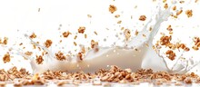 A Close Up Of A Milk Splash With Cereal Falling Into It