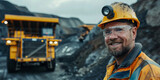 Fototapeta Konie - Portrait Miner worker man in hard hat background big yellow mining truck for coal. Concept Open pit mine industry.