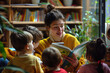 Young female teacher of nursery school or kindergarten reading a book to a group of children in class