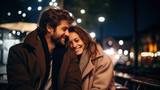 Fototapeta  - Beautiful happy couple dating in evening street
