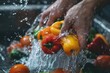 A person is washing a pile of vegetables in a sink