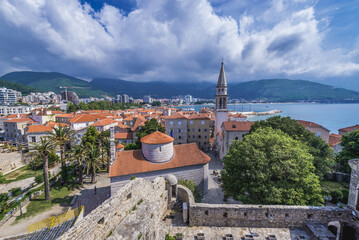 Wall Mural - View from historic Citadel on Old Town of Budva town with Holy Trinity Church, Montenegro