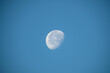 The Moon in daytime in a blue sky has something beautiful