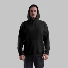 Poster - Mockup of a black oversized hoodie on a brutal man in a hood, wide clothing with a pocket, laces, cuff, front.