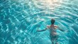 Swimmer basking in a glistening aqua pool