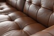 Detailed view of a brown leather couch, suitable for furniture or interior design concepts