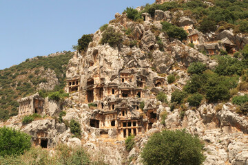 The famous rock hewn, rock cut lycian tombs at the ancient site of Myra, close to Demre, Turkey