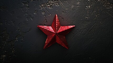 Poster - A striking red star contrasted against a black background. Perfect for various graphic design projects