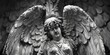 Black and white photo of an angel statue. Suitable for various design projects