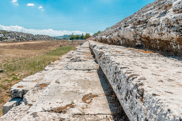 Picturesque ruins of the stadium in the ancient city of Perge. Ruins of the city of Perge in Turkey.