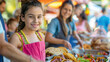 Bright and inviting image of a young girl serving traditional food with smiles and a blurred crowd in the background