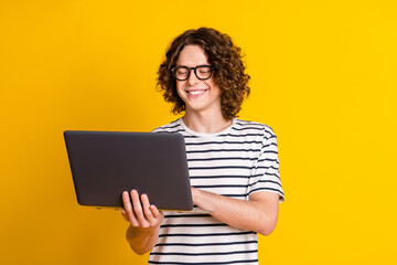 Poster - Photo portrait of nice teenager man instagram twitter facebook telegram dressed stylish striped clothes isolated on yellow color background