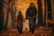 Father and little son having fun riding bicycles together in the picturesque park setting
