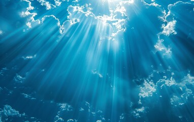 Poster - A clear sky dotted with fluffy white clouds. The sunlight filters through the clouds, casting a warm glow over the landscape. The scene radiates tranquility and serenity.