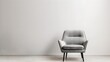 Modern minimalist interior design with a stylish grey armchair. Ideal for contemporary home decor and office spaces. Clean, elegant, and simple. Perfect for stock photography. AI