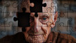 Puzzle of an old man with Alzheimer's. Concept of illness, memory loss, dementia and Alzheimer's in older people.
