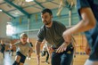 © evgenia_lo - Man coaching children in a gymnasium during sports practice