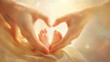 Two hands creating a heart shape around the small feet of a newborn baby, filled with warmth