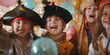 © MNStudio - Cheerful six years old kids wearing pirate costumes and hats celebrating birthday outdoors with colorful flag garland and balloons. Children birthday party.