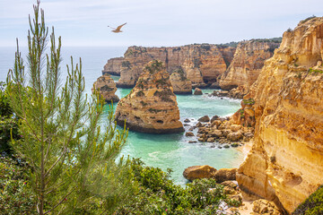 Wall Mural - Cliffs and ocean, Praia da Marinha, Algarve, Portugal