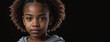 10-12 Years African American Juvenile Girl, Isolated On A Black Background With Copy Space