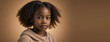 An African American Youthful Girl, Isolated On A Amber Background With Copy Space