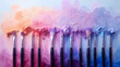 brushes in paints on a background of pastel colorful spots
