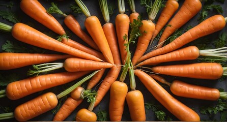 Wall Mural - Orange carrots with green leaves. Fresh vegetables background. Top view