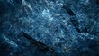 Dark blue vibrant large granite background. ?lose-up shot of a wet blue stone texture.