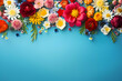 Colorful spring flowers on blue background.