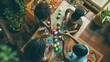 A group of children are gathered around a table, engaging in the leisure activity of decorating Easter eggs. This fun art event combines recreation, visual arts, and play in a circle of excitement
