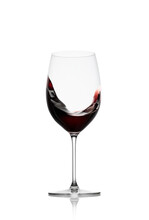 Red Wine In A Glass With Splash Isolated On White Background