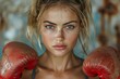 Determined looking woman with freckles, wearing worn red boxing gloves, shows resilience