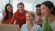 © stockbusters - Greeting people waving hands computer at office closeup. Startup team video call