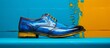 A close up of a stylish pair of shoes resting on a vibrant blue surface, showcasing their design and texture