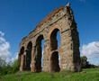 Ruins of the ancient Acqua Claudia aqueduct at Parco degli Acquedotti, Rome, Italy