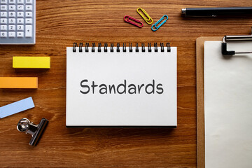Poster - There is notebook with the word Standards. It is as an eye-catching image.