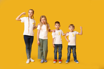 Sticker - Group of kids with yellow ribbons on color background. International Childhood Cancer Day