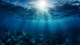 Fototapeta Do akwarium - Sunlight Piercing Ocean Depth with Marine Life