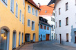 Colorful buildings along a street in historic Fussen, is a small town in, Germany.