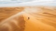 Solitary Figure Traversing the Vast,Windswept Desert Dunes - A Journey of Solitude and Contemplation