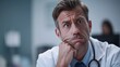 Concerned Medical Professional Ponders Diagnosis with Furrowed Brow in Pensive Contemplation Shallow Depth of Field with Copy Space Above