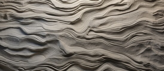 Poster - Close-up view of a massive wall featuring an intricate wave design, creating a stunning visual pattern