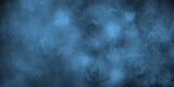 Fototapeta Konie - Blue grunge smoky cloud texture background. Abstract Light ink canvas for modern creative grunge design. Blue color dust particles explosion dramatic smoke in the room. Vivid textured aquarelle art