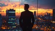 © ASHFAQ - Full body portrait of successful businessman wearing a suit standing near panoramic windows, looking at sunset over city with skyscrapers