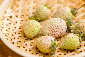 Poster - White strawberry arranged on a basket