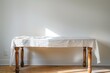 Serene Table and White Cloth in Natural Light