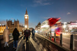Fototapeta  - London street scene at night with red bus and Big Ben
